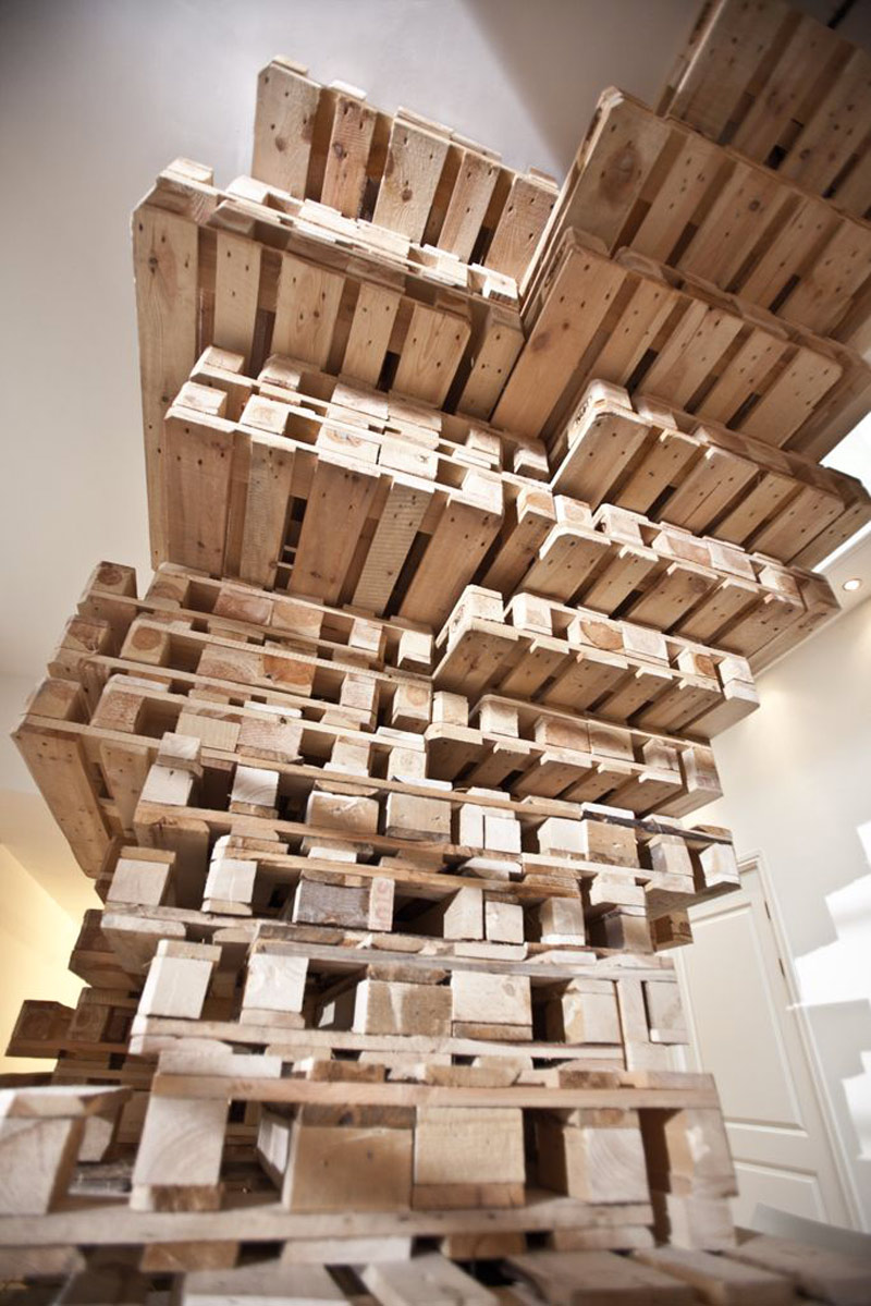 Stacks of pallet at the Brandbase Pallet Office by MOST Architecture