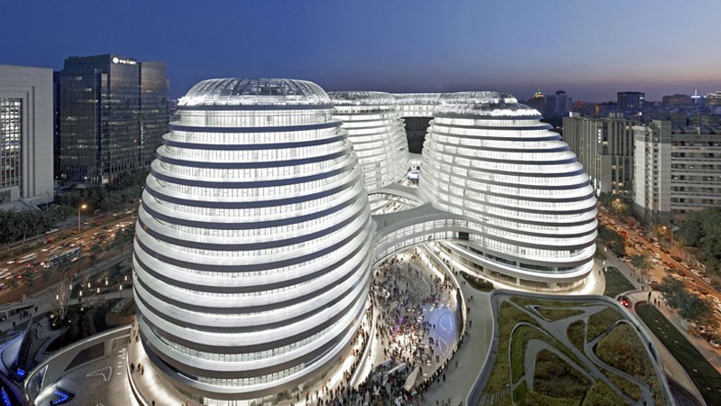 Aerial view during the evening of the Galaxy SOHO Complex in Beijing by Zaha Hadid