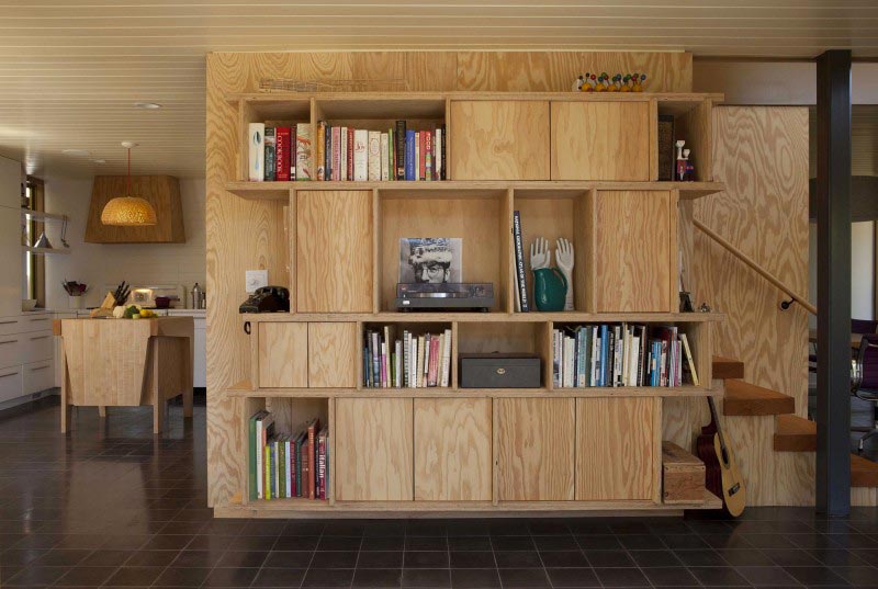 Wood shelving unit at the Exterior architecture view of the Smith Clementi Residence by Rios Clementi Hale Studios