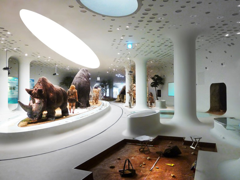 Prehistoric men and women at the Jeongok Museum South Korea Prehistory Museum by X-TU Architects