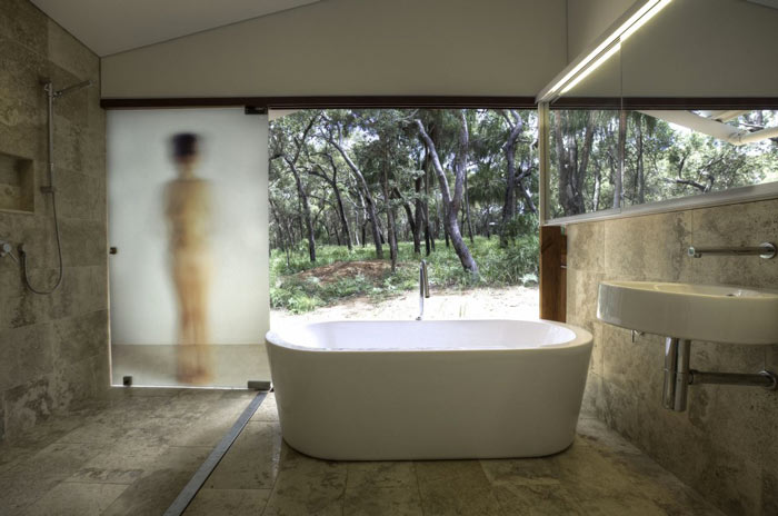 White baththub in the bathroom at the Drew House by Simon Hills of Anthill Constructions