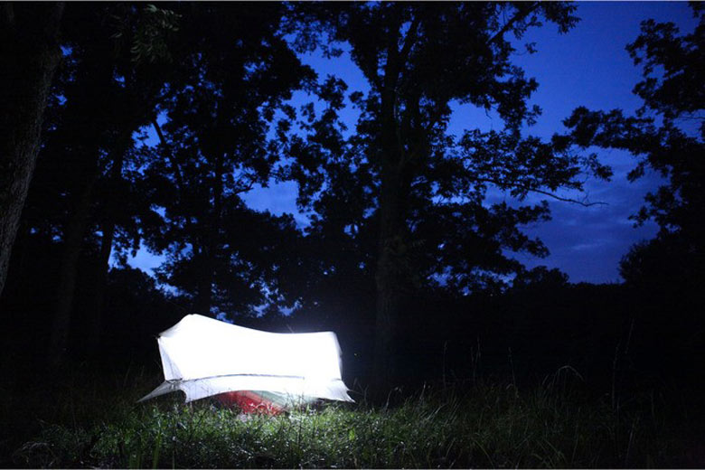 Nube Hammock Shelter by Sierra Madre being used outdoors during the evening