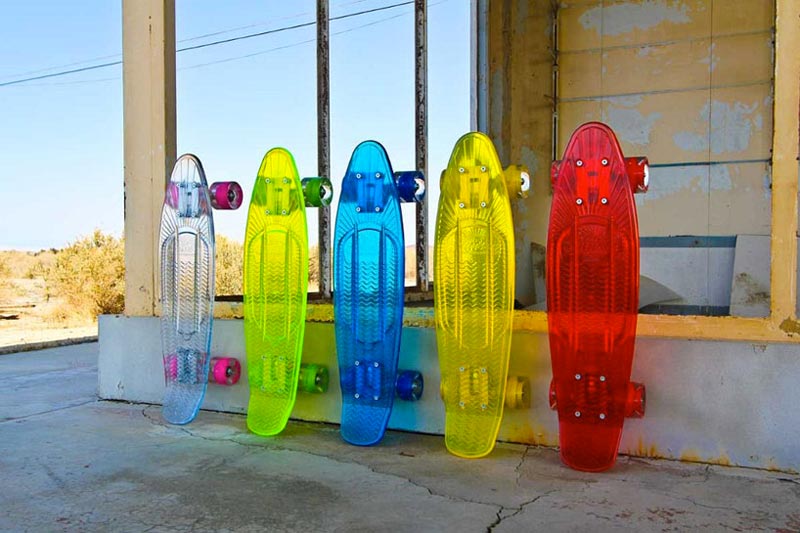 Sunset Skateboards's LED Light Skateboards transparent, green, blue, yellow and red colored side by side