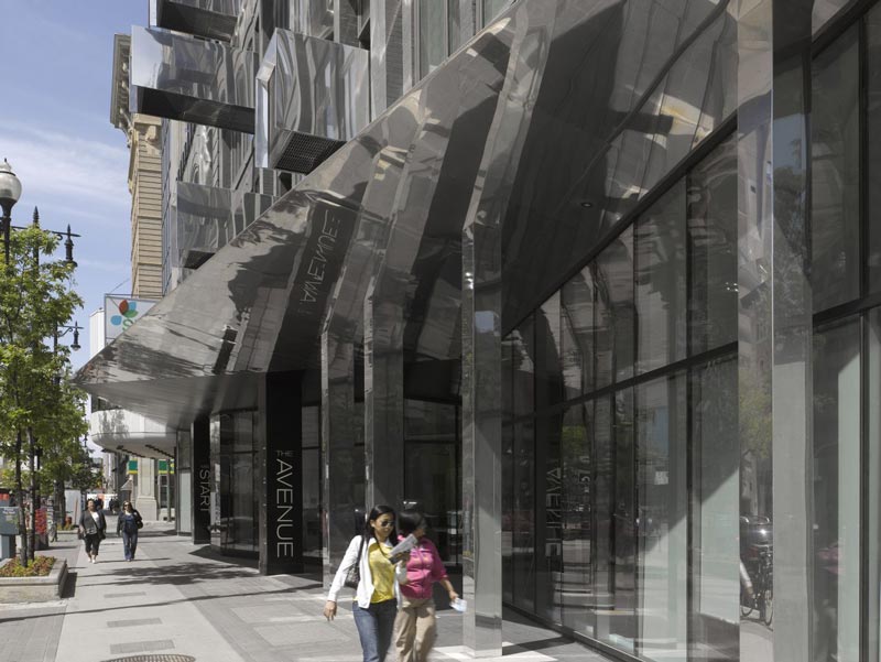 Street level view of The Avenue On Portage by 5468796 Architecture