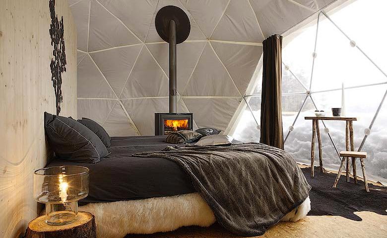 Interior design of a room at the Whitepod Hotel in the Swiss Alps in Switzerland