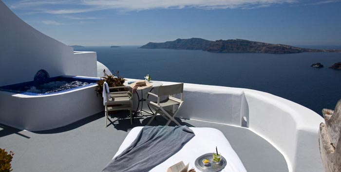 Patio with a beautiful view at Ikies Traditional Houses in Santorini
