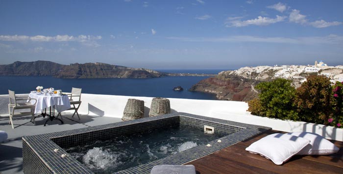 Outdoor jacuzzi at the Ikies Traditional Houses in Santorini