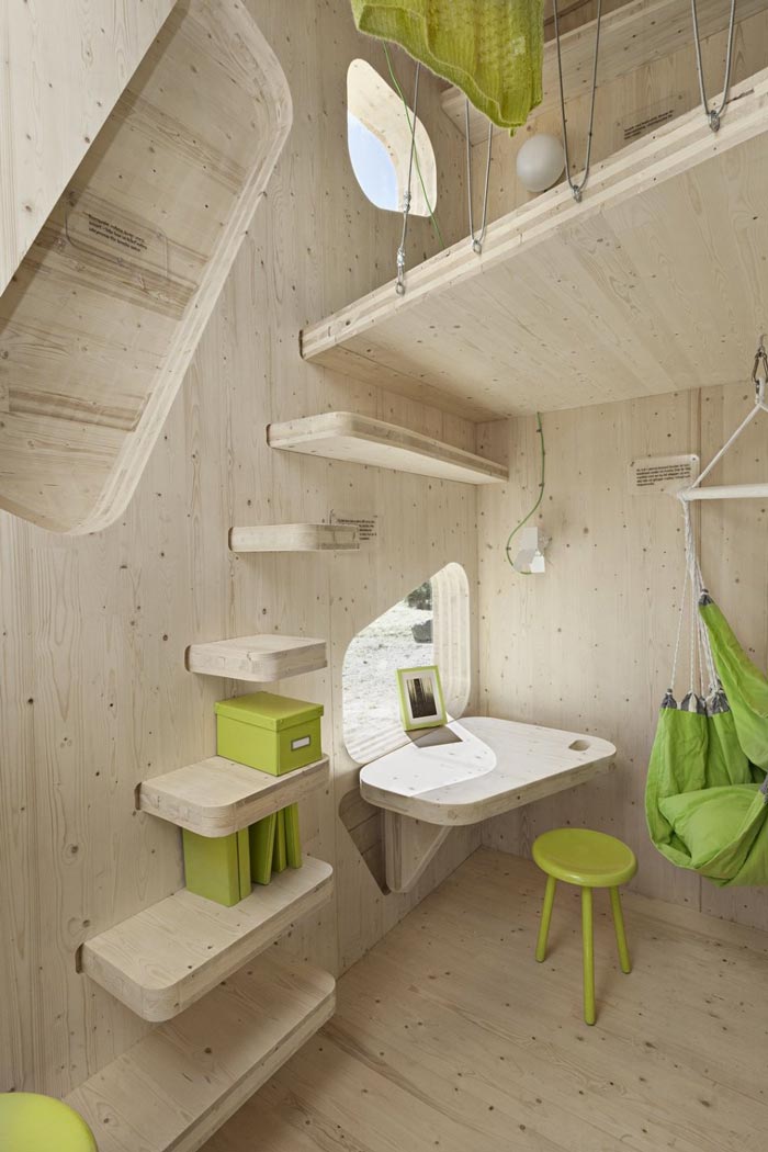 Interior decor of the wooden stairs wooden walls of the Micro Cottage for Students at Virserum Art Museum Sweden