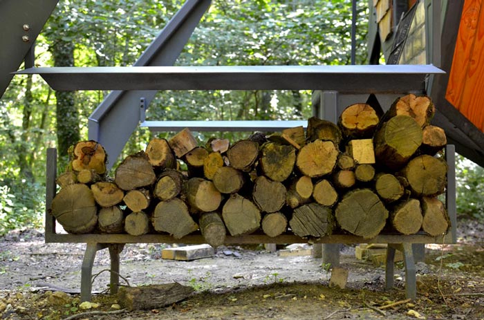 Wooden logs stacked on top of each other