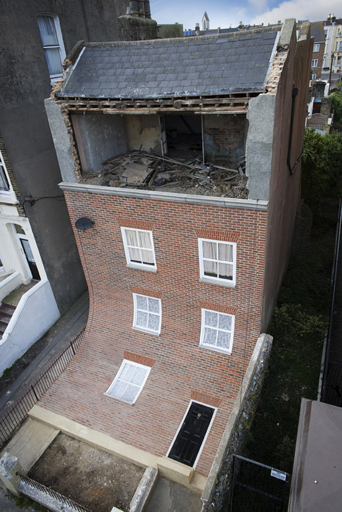 View of the exterior at "From the Knees of My Nose to the Belly of My Toes" by Alex Chinneck