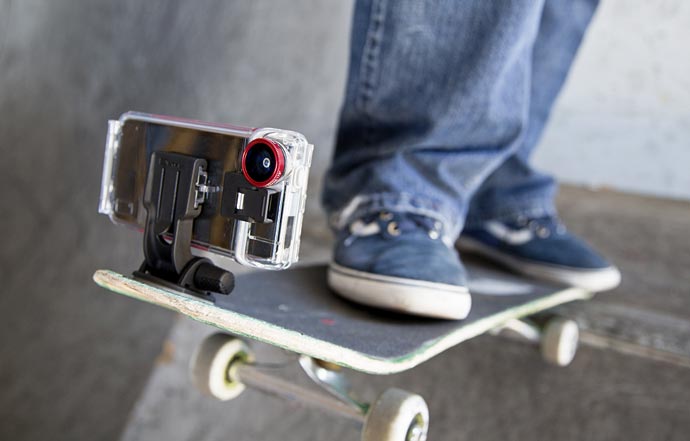 Optrix XD5 Waterproof Action Camera iPhone Case attached to a skateboard