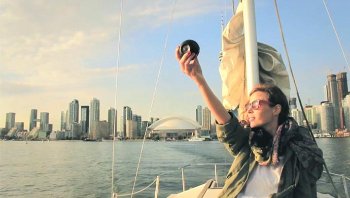 Woman holding the BUBL CAM 360º CAMERA