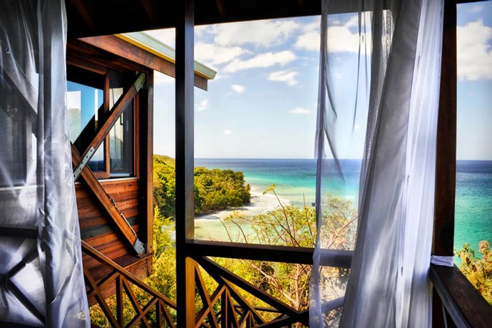 View of the ocean from a bungalow at Secret Bay Resort