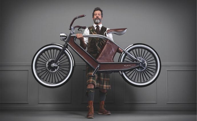 Man holding the Cykno Electric Bicycle