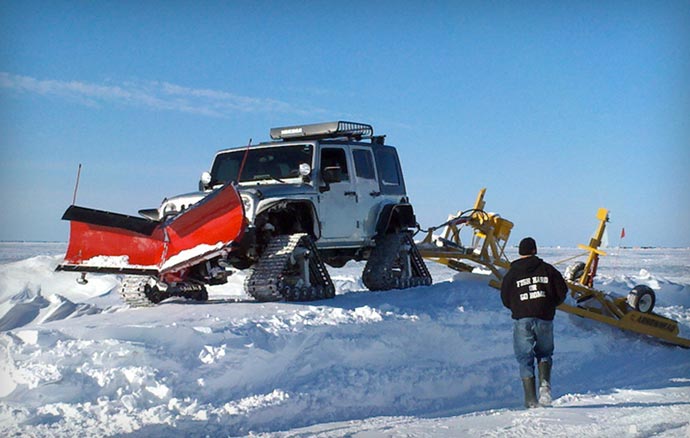 Dominator Tracks snow removal jeep