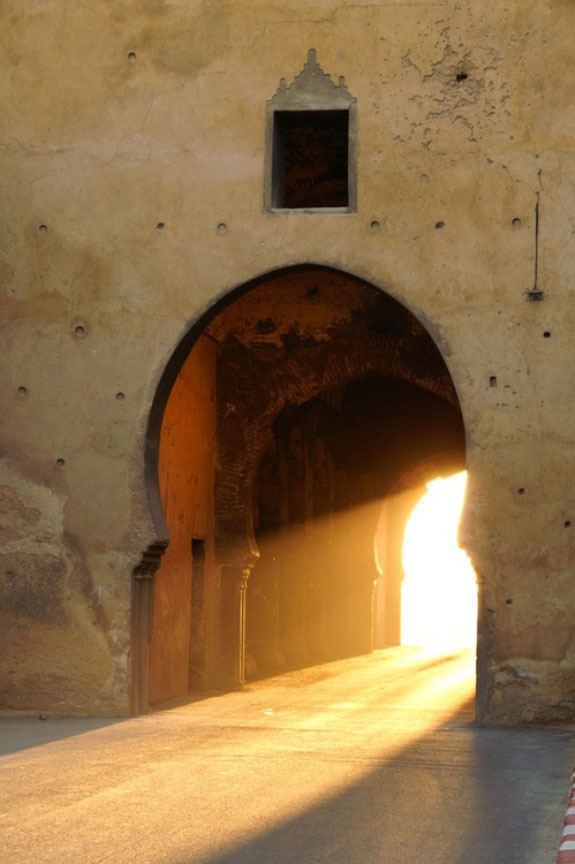Arabic city doors with sunlight going through them