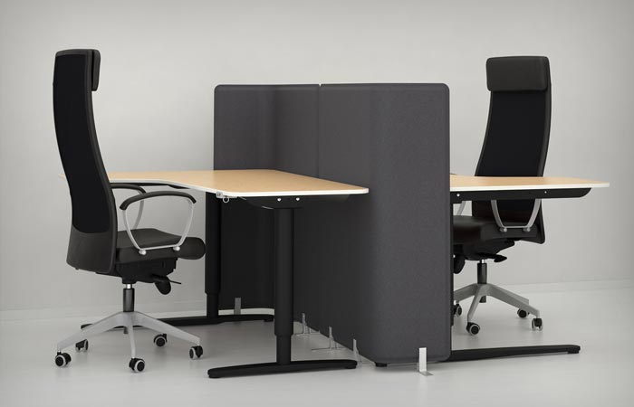 Ikea Bekant Sit Stand Desk in an office setting