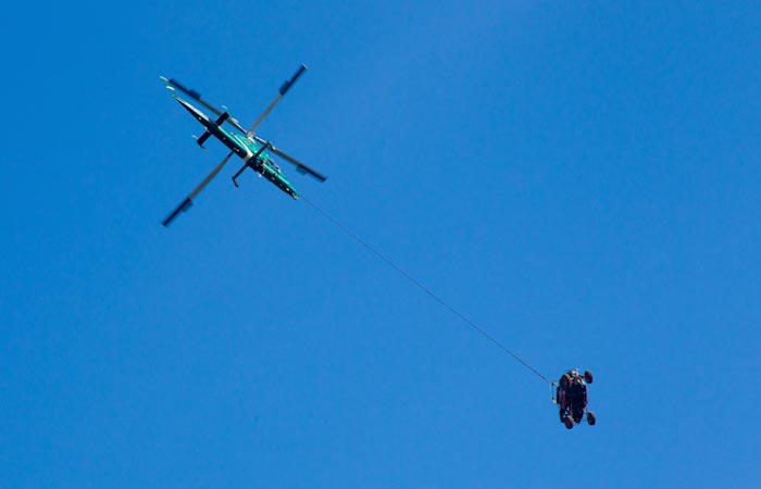 Polaris being towed by a helicopter