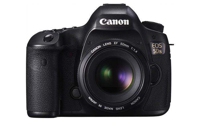 Canon EOS 5DS digital SLR with lens