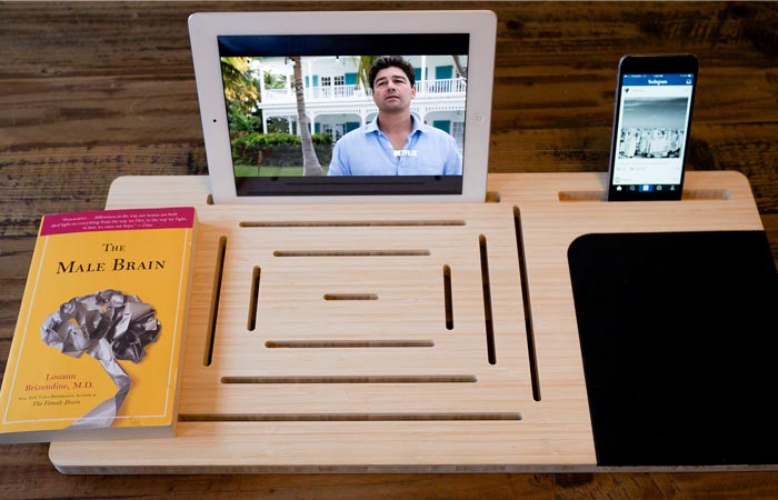 Tablet and smartphone on a bamboo table