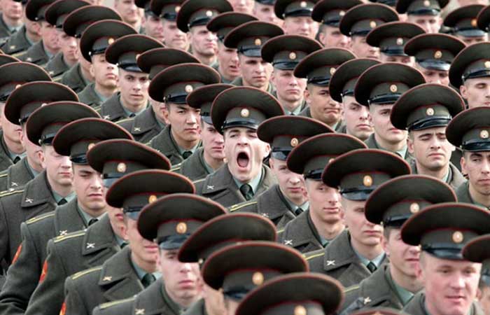 Many soldiers, one yawning