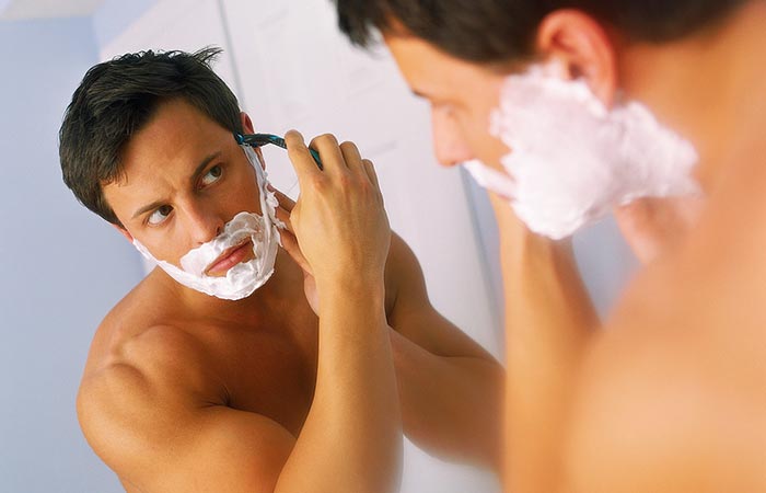 A man shaving beard
