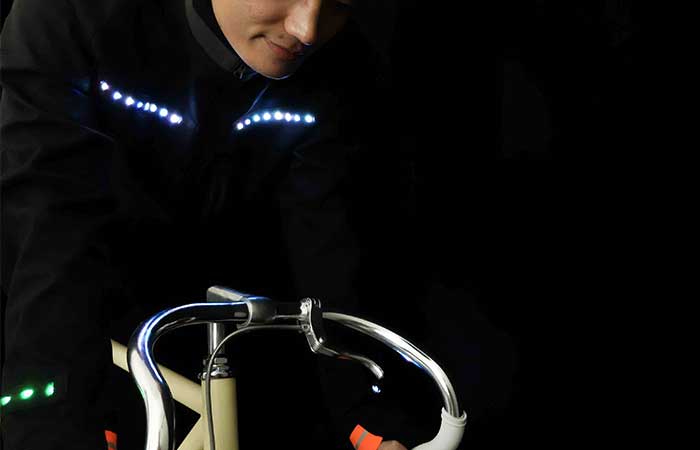 LED illuminated clothes from Lumenus on a cyclist