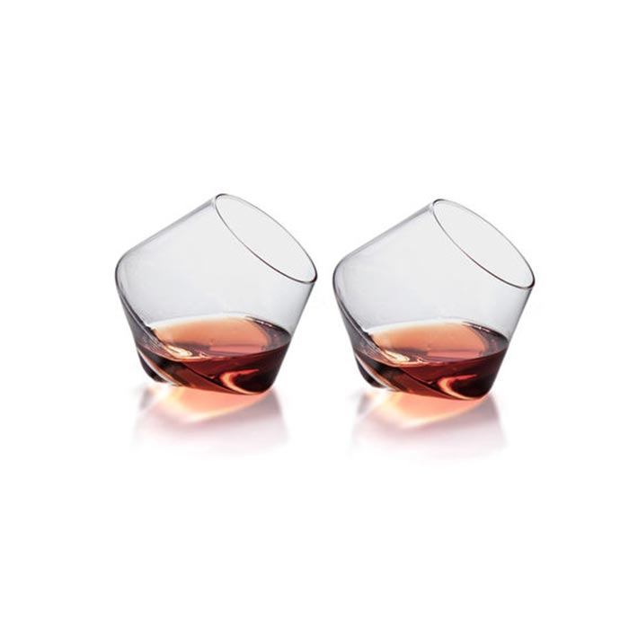 Two whiskey glasses captured from the front. 
