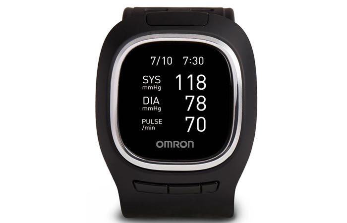 Omron Blood Pressure Monitor Watch, black, on a white background, showing blood pressure values on the display.