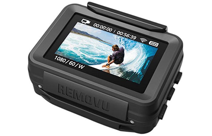 Removu P1 GoPro Live Viewer, tilted, on a white background, with an image of a person surfing on the screen.