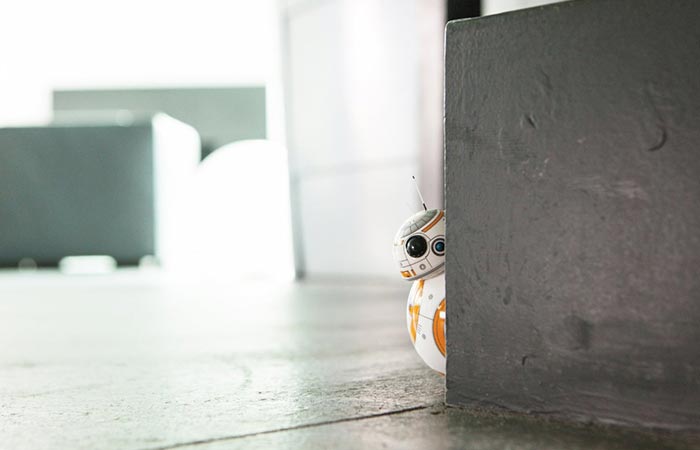 BB-8 is hiding behind the wall. 