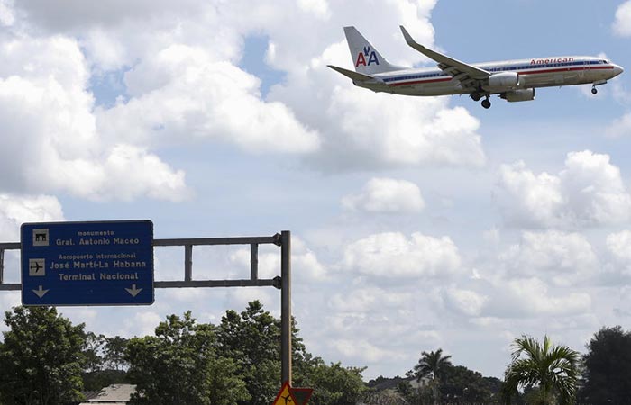 An American Airlines plane in the sky near the Airport Nacional in Havana, Cuba.