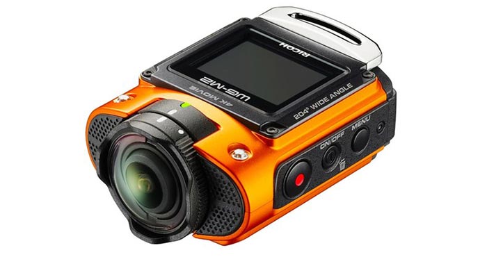 An orange camera captured from an angle. 