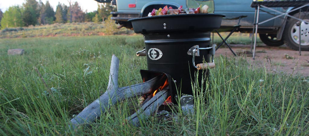M-5000 Envirofit Rocket Stove being used outside