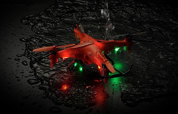 GPTOYS F51C RC Quadcopter in water with it's LED lights on