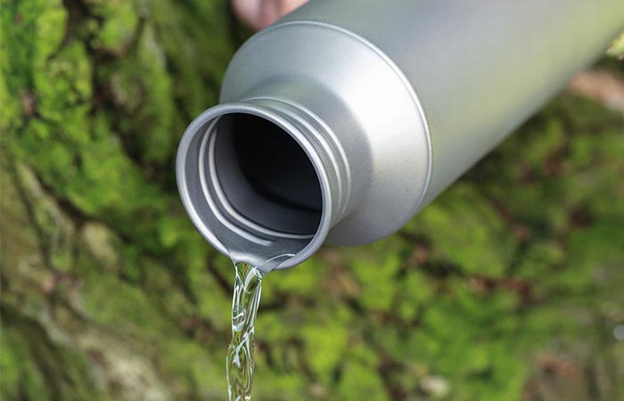 Pouring Water From Vargo Titanium Water Bottle