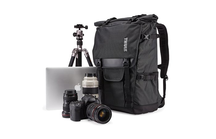 Thule Covert DSLR Rolltop Backpack With Camera Eqipment Next To It