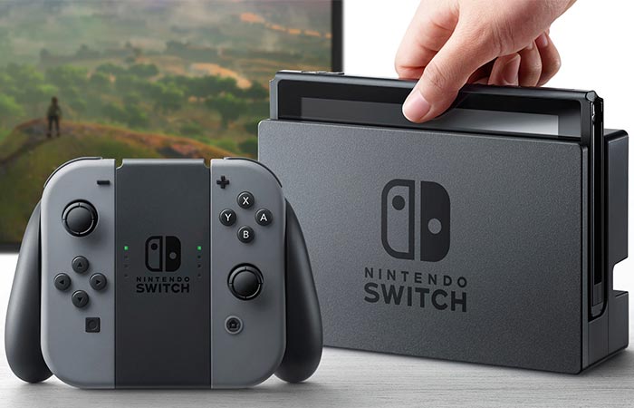 Nintendo Switch with its gamepad and docking station