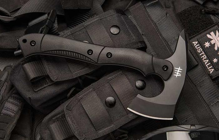 Hardcore Hardware Compact Tactical Tomahawk in black on a vest