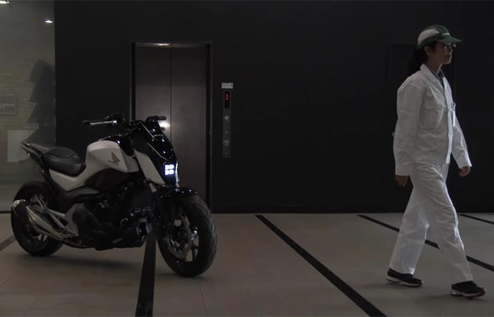 Honda’s Self-Balancing Motorcycle following a Honda R&D researcher