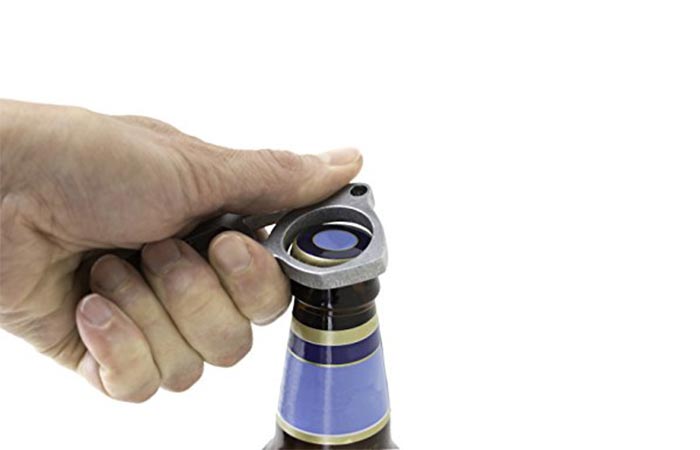 Readyman EDC Defense Tool being used to open up a beer bottle
