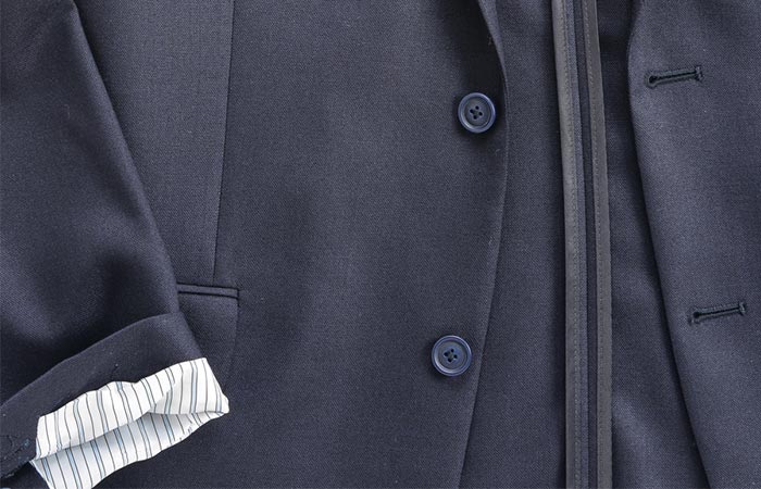 a detail on the blue blazer