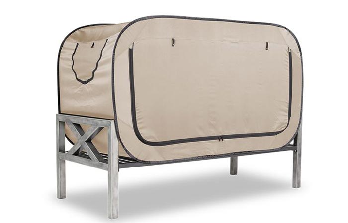 The Bed Tent in tan with the doors zipped closed
