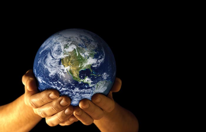 Person holding the world in their hands