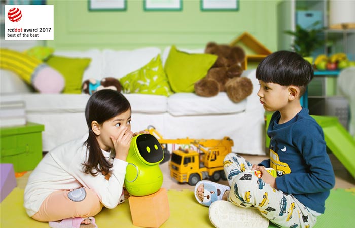 kids playing with a green ROOBO BeanQ Robot