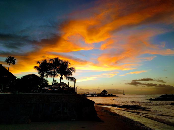 View of a sunset from a beach in the Seychelles